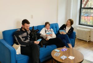family playing triple tongue twister in the living room